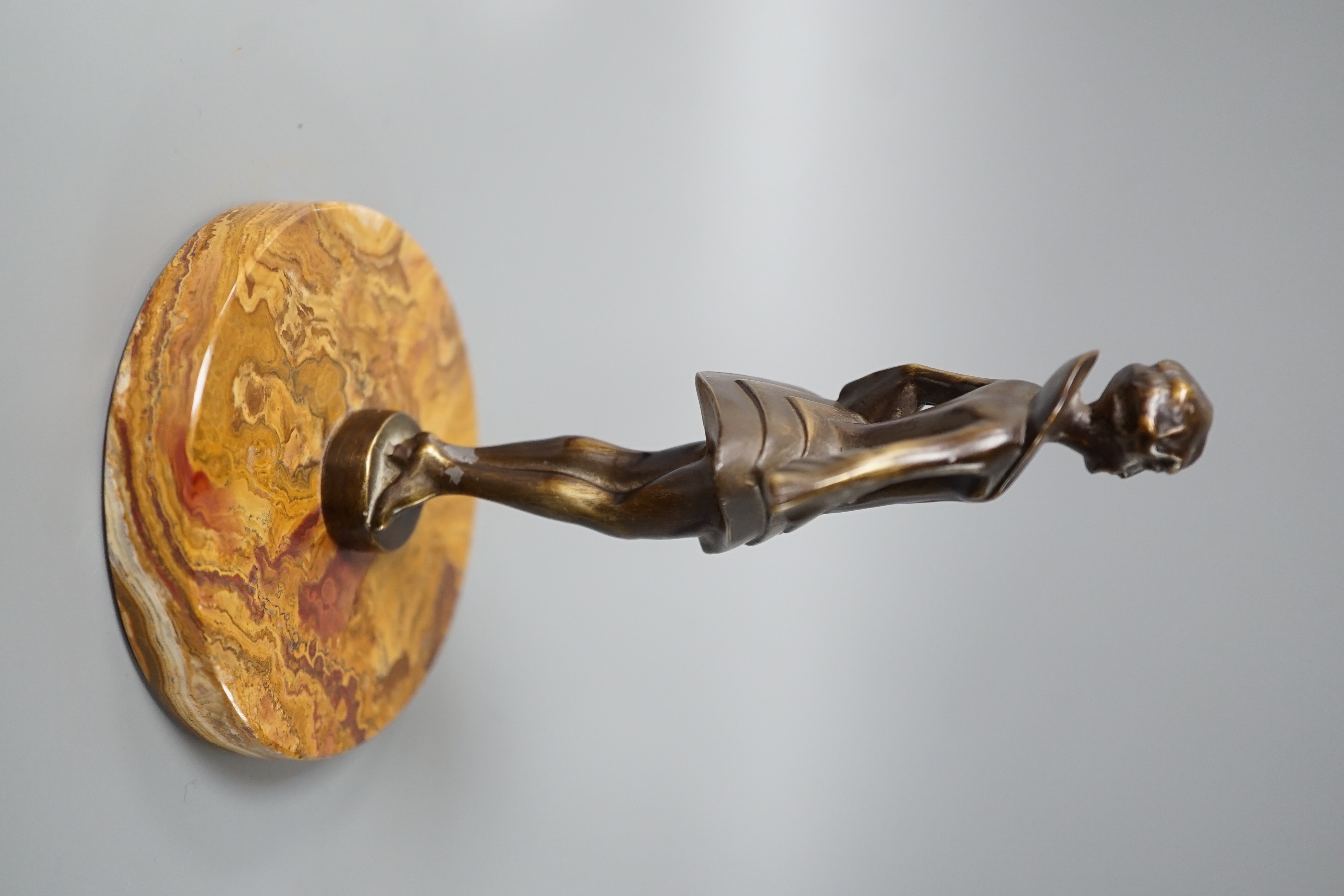 An Art Deco style bronze figure of a woman, 17 cms high.